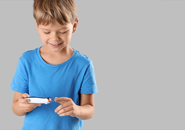 Child holding a medical device, highlighting the importance of usability and risk analysis in ensuring device safety for vulnerable users.